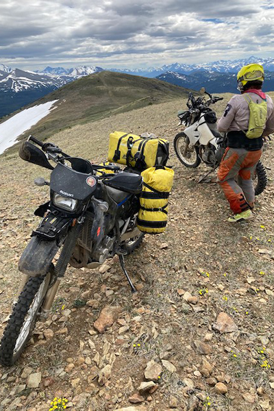 Dual sport biking bridge river valley